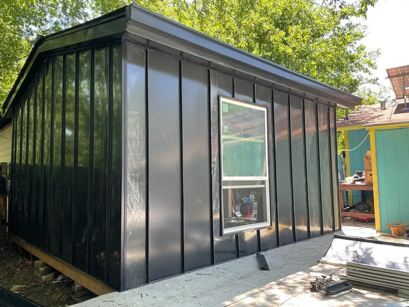 Black standing seam metal wall panels for Metal Roof Installation in Mendon