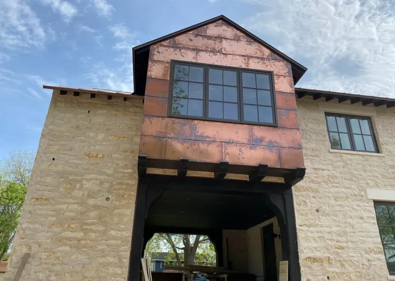Copper metal panel facade on a stone building for Metal Roof Coating in Mendon